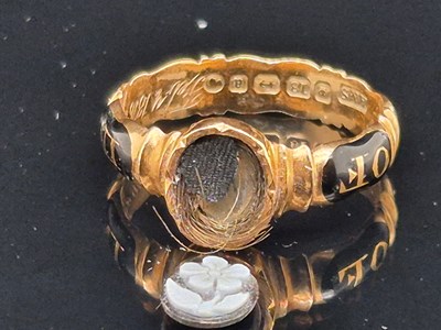 Lot 73 - A Victorian 18ct hallmarked gold mourning ring...