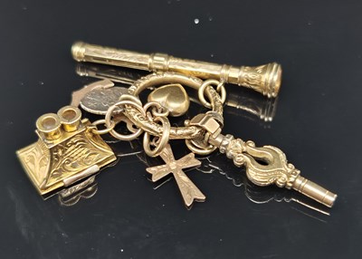 Lot 77 - A small collection of antique gold charms...