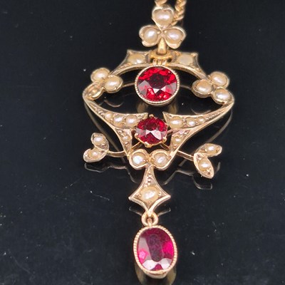 Lot 85 - An antique garnet and seed pearl Art Nouveau...