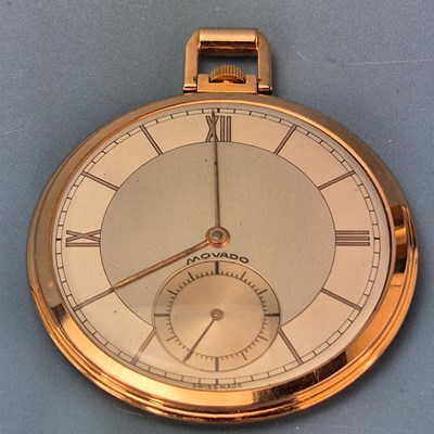 Lot 552 - A Movado 18ct gold slimline pocket watch with...