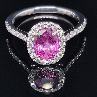 Lot 96 - A hallmarked platinum pink sapphire and...