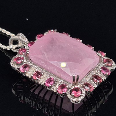 Lot 102 - A large rectangular rose-cut morganite and...
