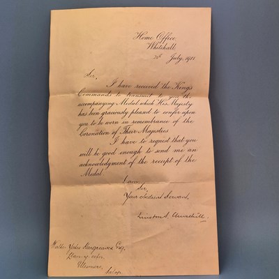 Lot 573 - A 1911 Home Office letter concerning a...