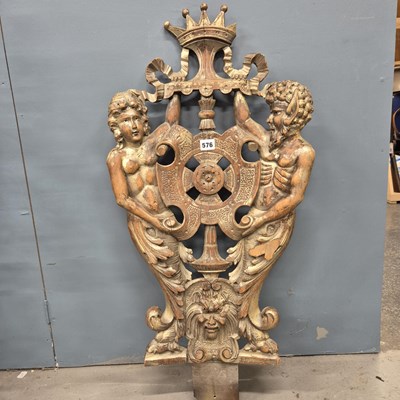 Lot 576 - A carved and pierced silvered mahogany crowned...