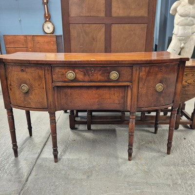 Lot 579 - A George III mahogany sideboard, the central...