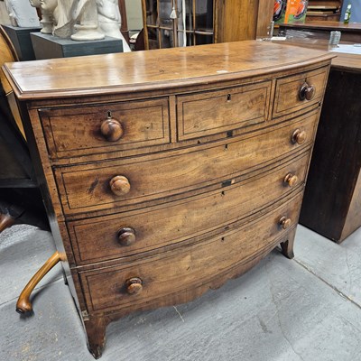 Lot 581 - An ebony line inlaid mahogany bow front chest...