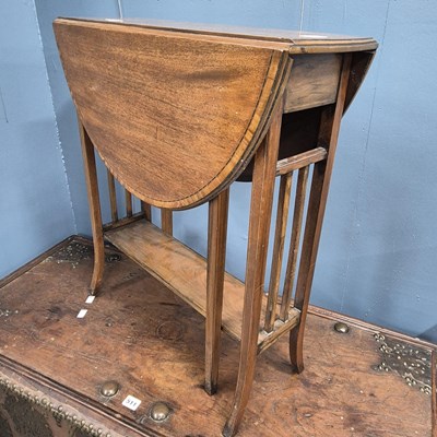 Lot 585 - A satin wood banded mahogany sutherland coffee...