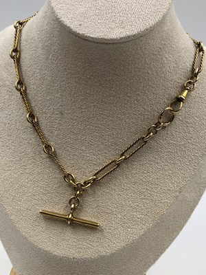 Lot 539 - An antique 15-carat gold watch Albert chain...