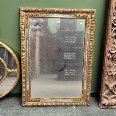 Lot 603 - A rectangular mirror in a gilt frame, the egg...