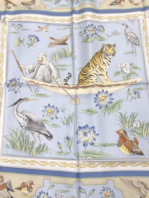Lot 1102 - A silk Salvatore Ferragamo scarf with a Bird...