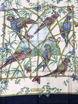 Lot 1109 - A Salvatore Ferragamo silk scarf with floral...