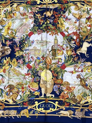 Lot 1120 - Gucci vintage silk scarf, continents and...