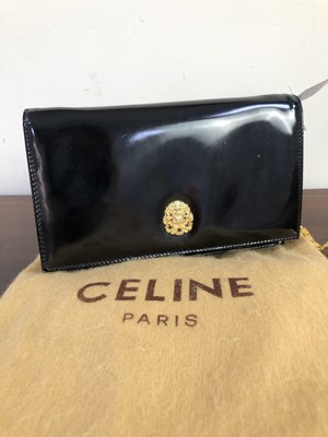 Lot 1132 - A small black patent Celine shoulder bag with...