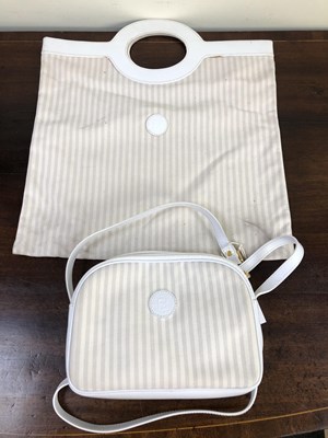 Lot 1140 - Fendi. A vintage white and cream crossbody bag...