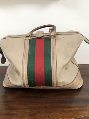 Lot 1146 - Gucci. A large Gucci canvas travel bag.