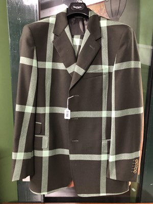 Lot 1148 - Three Paul Smith Suits. One Coral, one small...