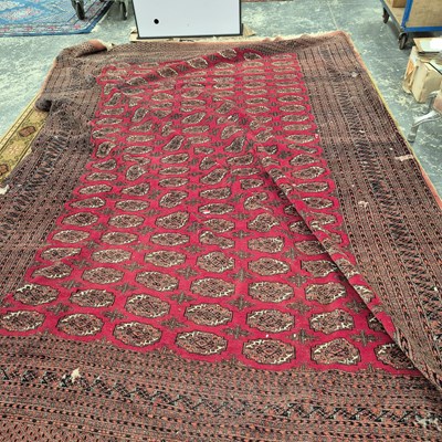 Lot 618 - An Oriental carpet of Bokhara design.