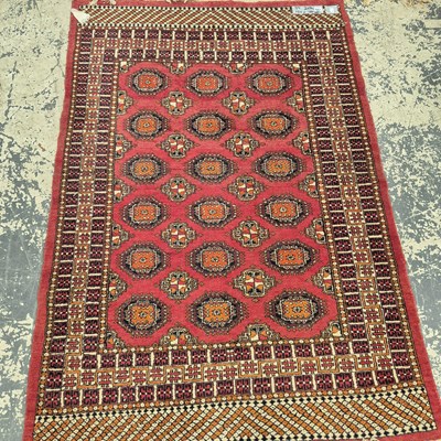 Lot 623 - Three oriental rugs of Bokhara design, largest...