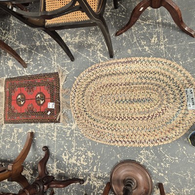Lot 631 - Two oriental mats and an ovalbraided small rug...