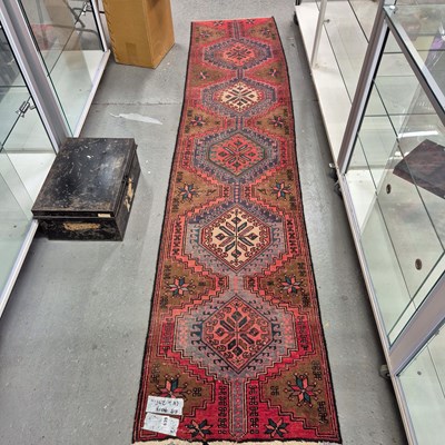 Lot 639 - A Persian tribal hand knotted runner. 295 x 63...