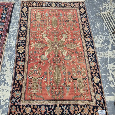 Lot 659 - An antique Persian sarouk rug. 118 x 192 cm