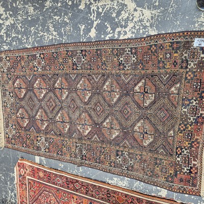 Lot 648 - An antique Belouch rug