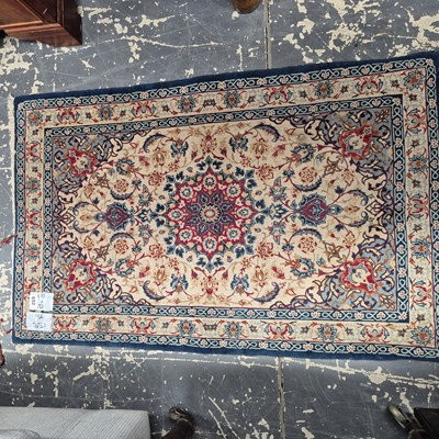 Lot 652 - A finely woven Persian Isfahan rug 110 x 70cm