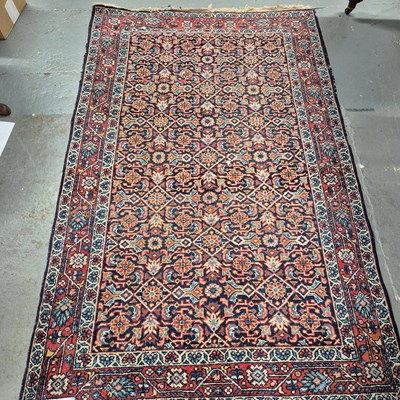 Lot 668 - An antique Persian Mahal rug. 208 x 132 cm.