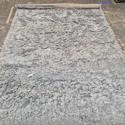 Lot 654 - A retro shag machine made carpet