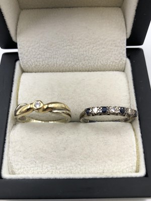 Lot 1003 - A 9ct hallmarked gold diamond and sapphire...