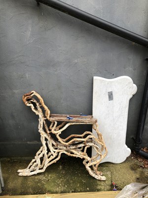 Lot 1261 - A pair of large antique cast iron bench ends...