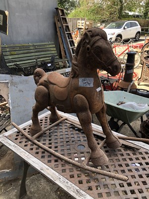 Lot 1304 - A vintage triang rocking horse. H 77 L 94 W 39 cm