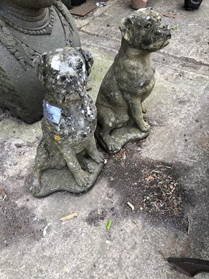 Lot 1305 - A large pair of Garden figures of seated dogs.