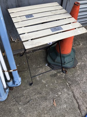 Lot 1308 - A folding patio table and two chairs.