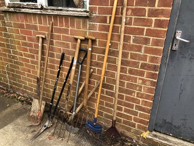 Lot 1311 - a collection of garden tools.