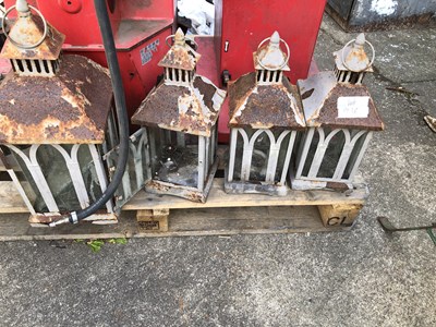 Lot 1316 - Four metal candle lanterns.