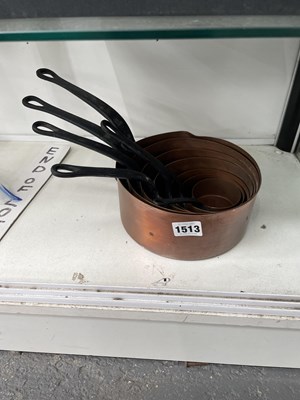 Lot 1513 - A nest of seven copper saucepans