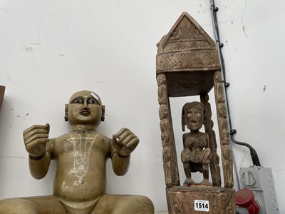 Lot 1514 - A tribal wooden figure of a lady and baby in a...