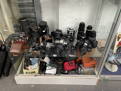 Lot 1549 - Rolleiflex, Pentax, and Nikon cameras, lenses...