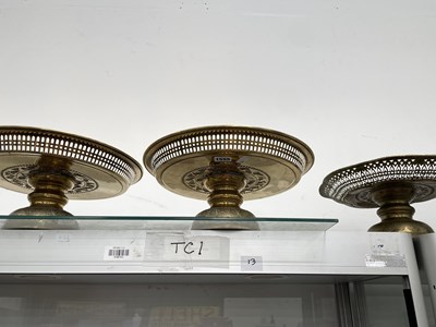 Lot 1555 - Six brass cake comports