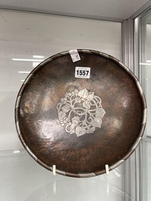 Lot 1557 - A Hugh Wallis copper dish centrally silvered...