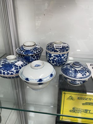 Lot 1558 - Five Chinese blue and white bowls and covers....