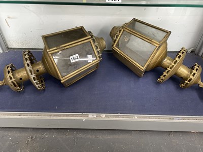Lot 1562 - A pair of glazed brass lanterns with...