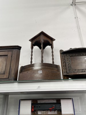 Lot 1570 - Two oak corner cupboards, a wine table and a...