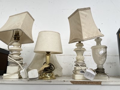 Lot 1590 - A pair of marble table lamps, another...