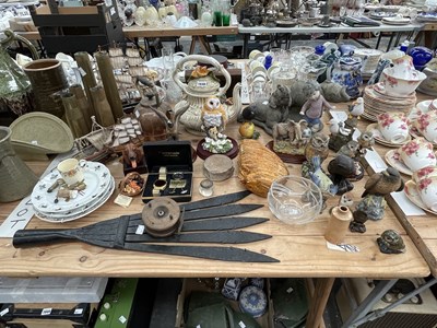 Lot 1646 - An eel spear, owl figurines, a fossil vertebra,...