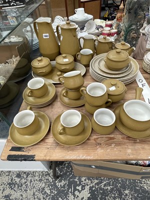 Lot 1663 - A Denby burnt orange stone ware breakfast set