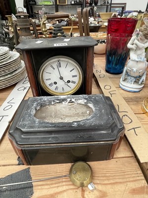 Lot 1668 - A black slate cased clock, a nest of copper...