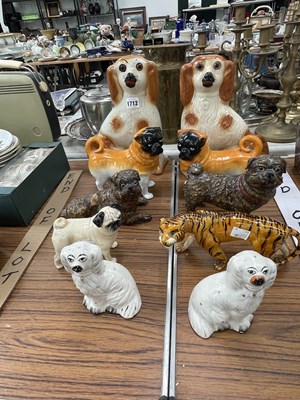 Lot 1712 - Four pairs of pottery dogs, a Beswick single...