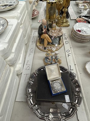 Lot 1739 - A Capodimonte clock repairer group, a miner's...